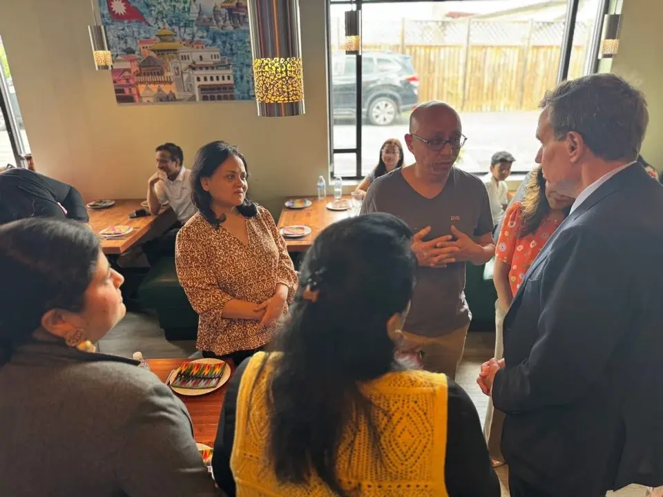 UTPSN community members during a public engagement with Senator Warner
